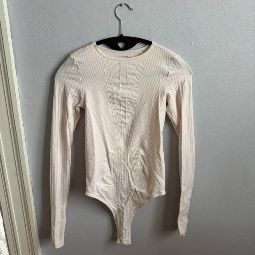Free people intimately light pink seamless bodysuit